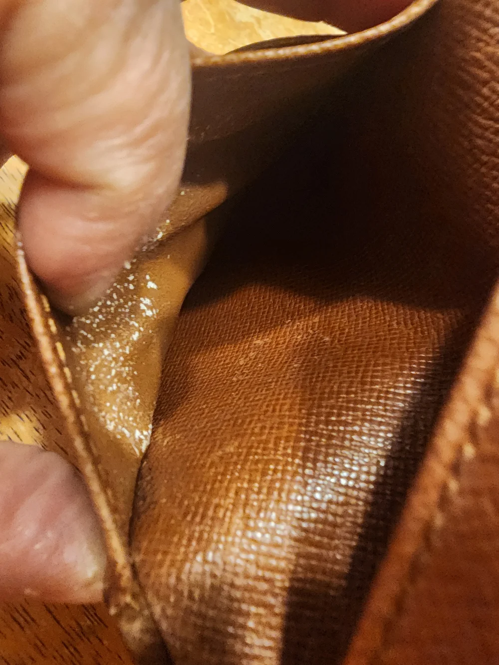 vintage Louis Vuitton Monogram Elise Wallet crafted in the classic brown LV